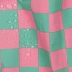 Beschichtete Baumwolle mit Vierecken in Pastellrosa und -grün